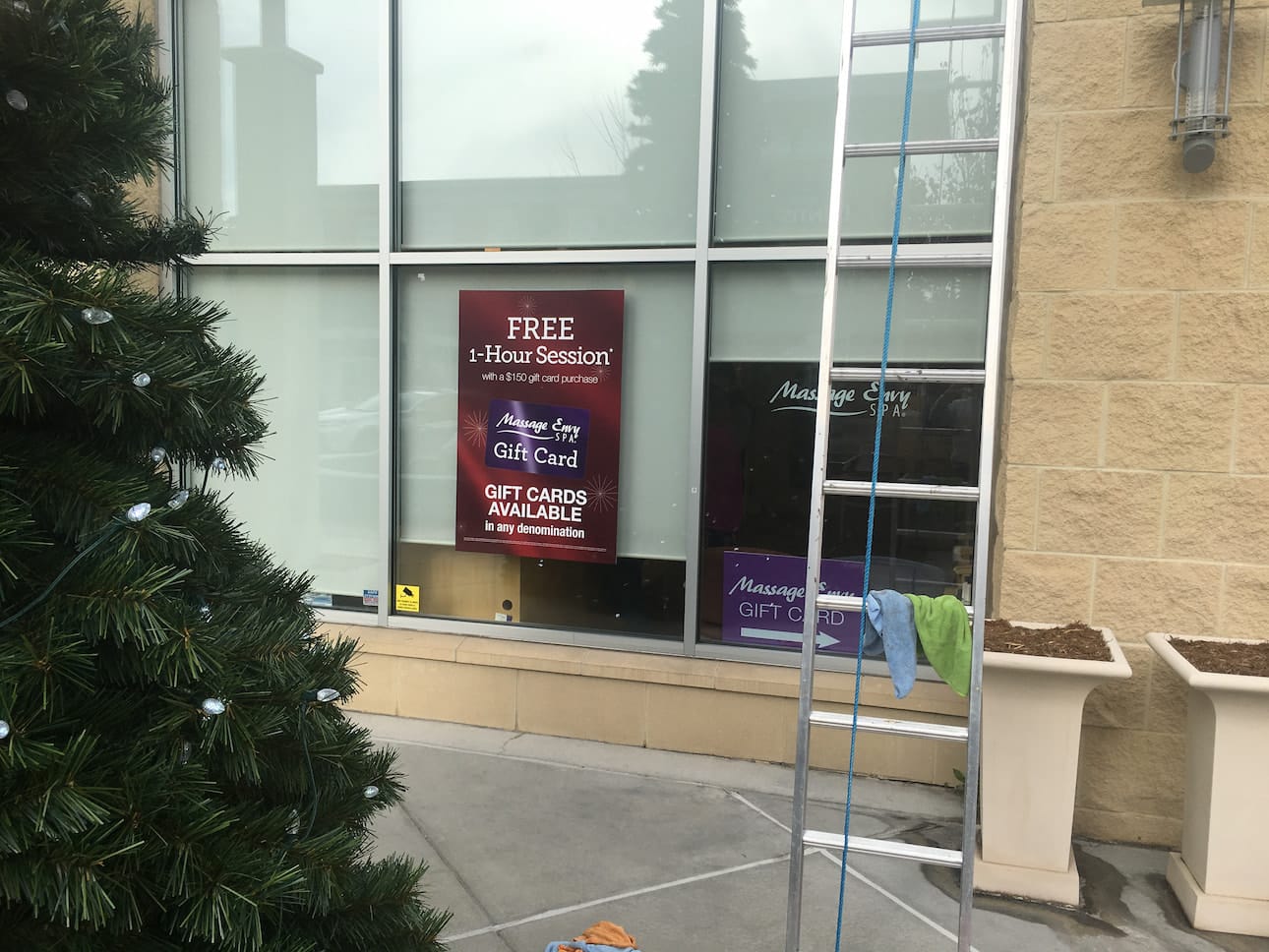 window-cleaning-cherry-creek Storefront window cleaning on a Cherry Creek North retail block