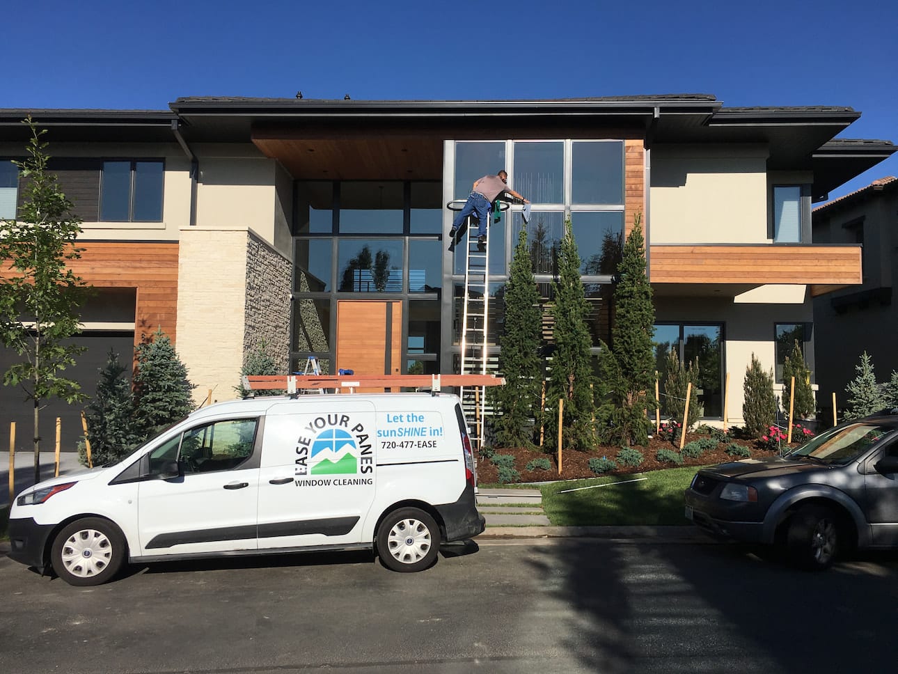 window-cleaning-cherry-hills-village Cleaning two-story foyer windows at a Cherry Hills Village estate